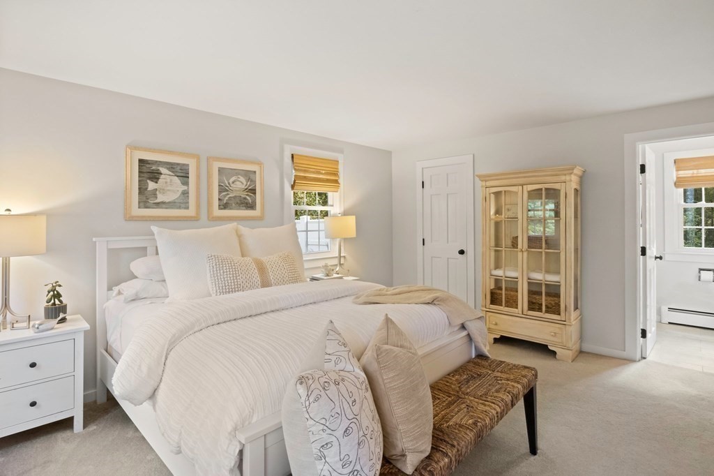 63 West Way Mashpee, MA 02649 - Photo 22 of 41 a spacious bedroom with a bed and a window