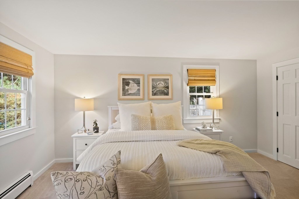 63 West Way Mashpee, MA 02649 - Photo 23 of 41 a bedroom with a bed and a window