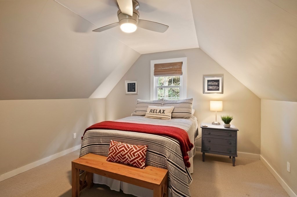 63 West Way Mashpee, MA 02649 - Photo 27 of 41 a bedroom with a bed and a window