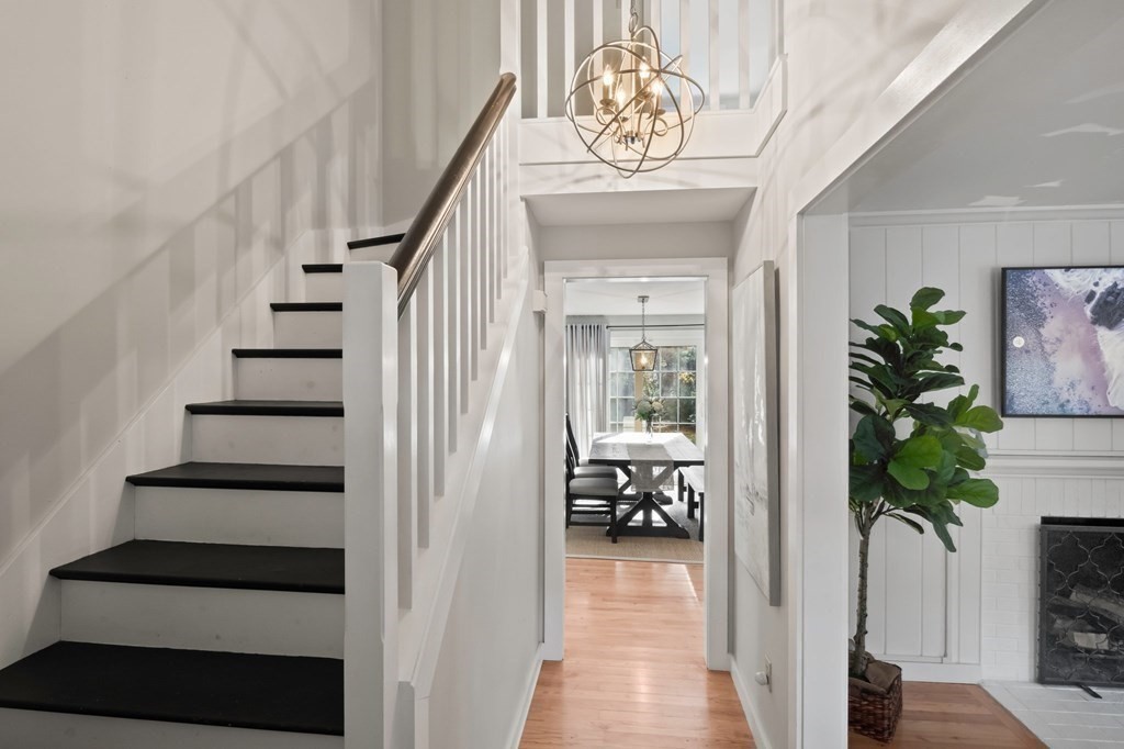 63 West Way Mashpee, MA 02649 - Photo 7 of 41 a view of entryway and hall with wooden floor