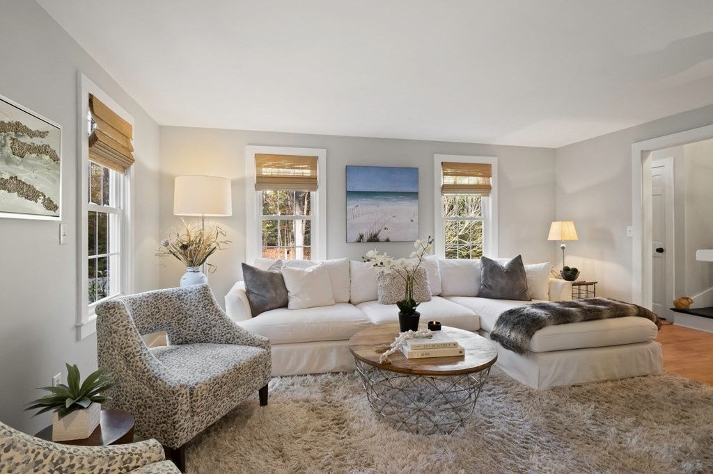 63 West Way Mashpee, MA 02649 - Photo 9 of 41 a living room with furniture potted plant and a window