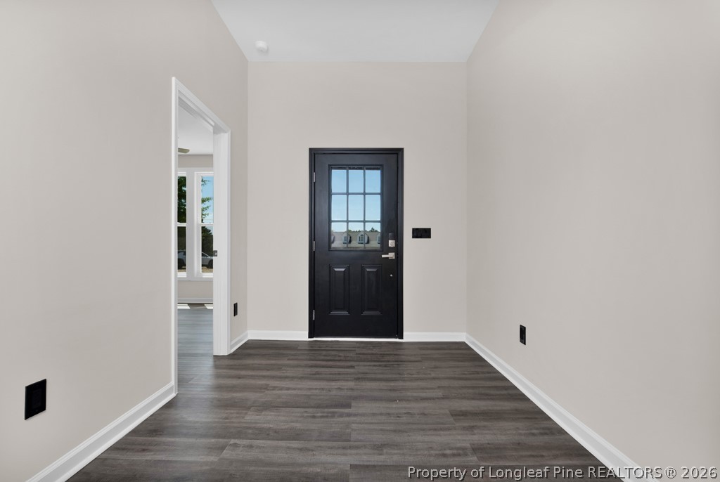 3025 Old Stage Road South Erwin, NC 28339 - Photo 4 of 50 a view of an empty room with wooden floor