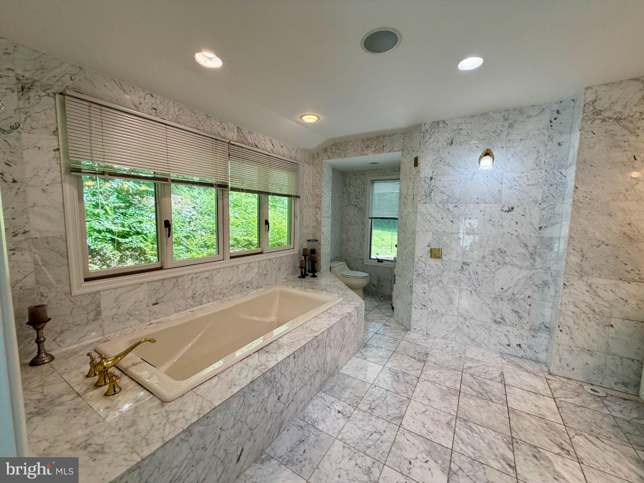 756 Campwoods Road Villanova, PA 19085 - Photo 30 of 38 Luxurious marble-clad bathroom retreat.