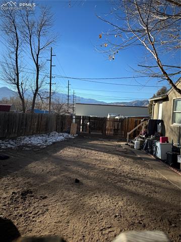 39 Sunflower Road, Unit A Colorado Springs, CO 80907 - Photo 14 of 23 View of yard with a mountain view