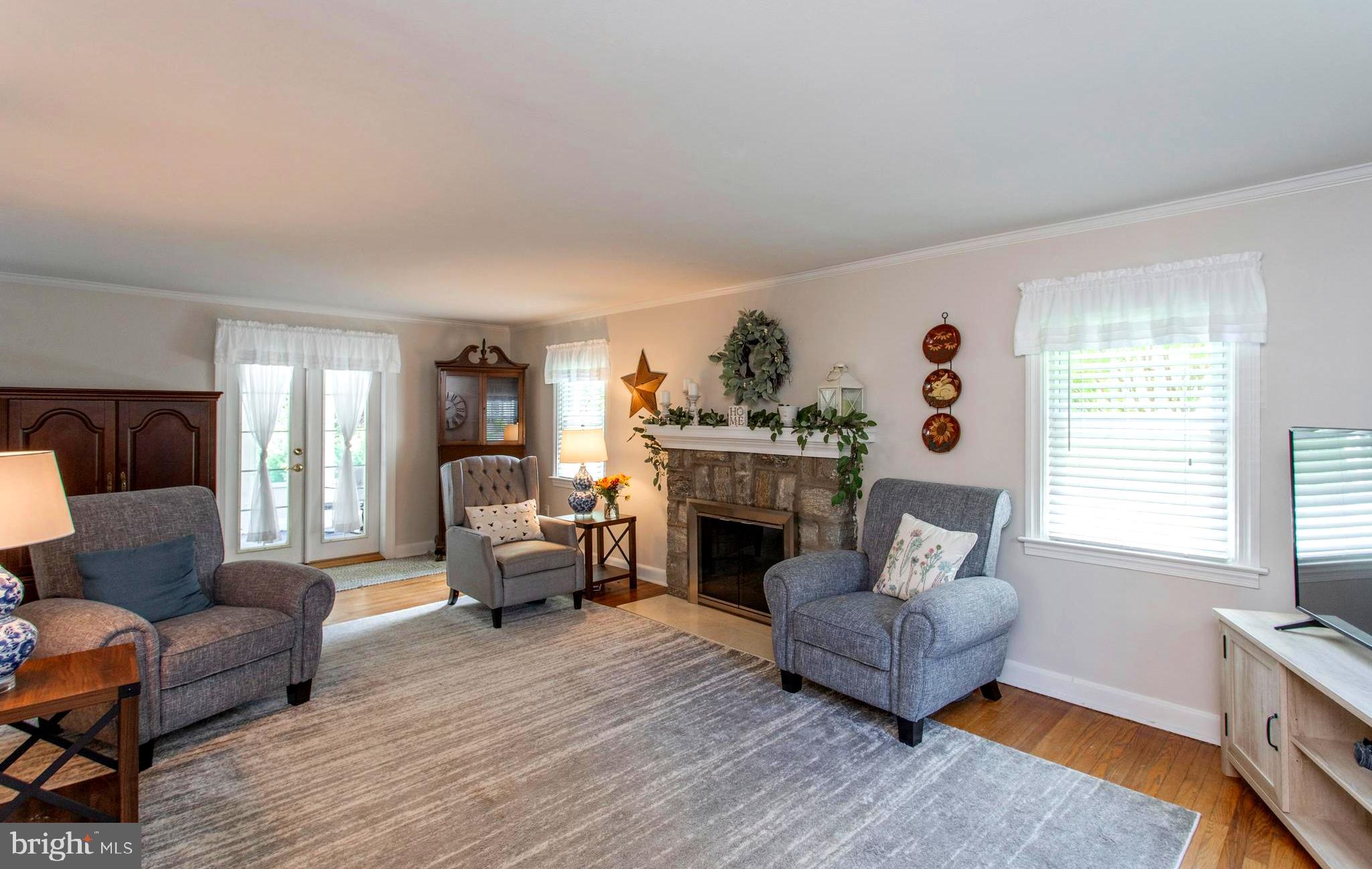 437 Garden Road Springfield, PA 19064 - Photo 13 of 41 Spacious Living Room with Gas Fireplace