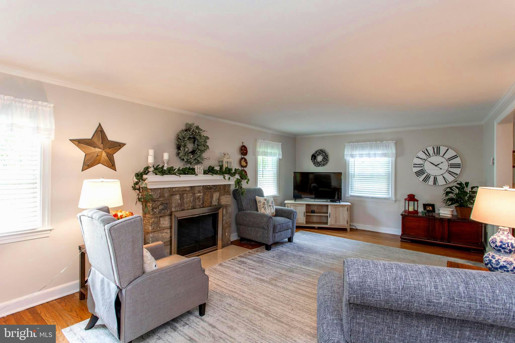 437 Garden Road Springfield, PA 19064 - Photo 14 of 41 Spacious Living Room with Fireplace