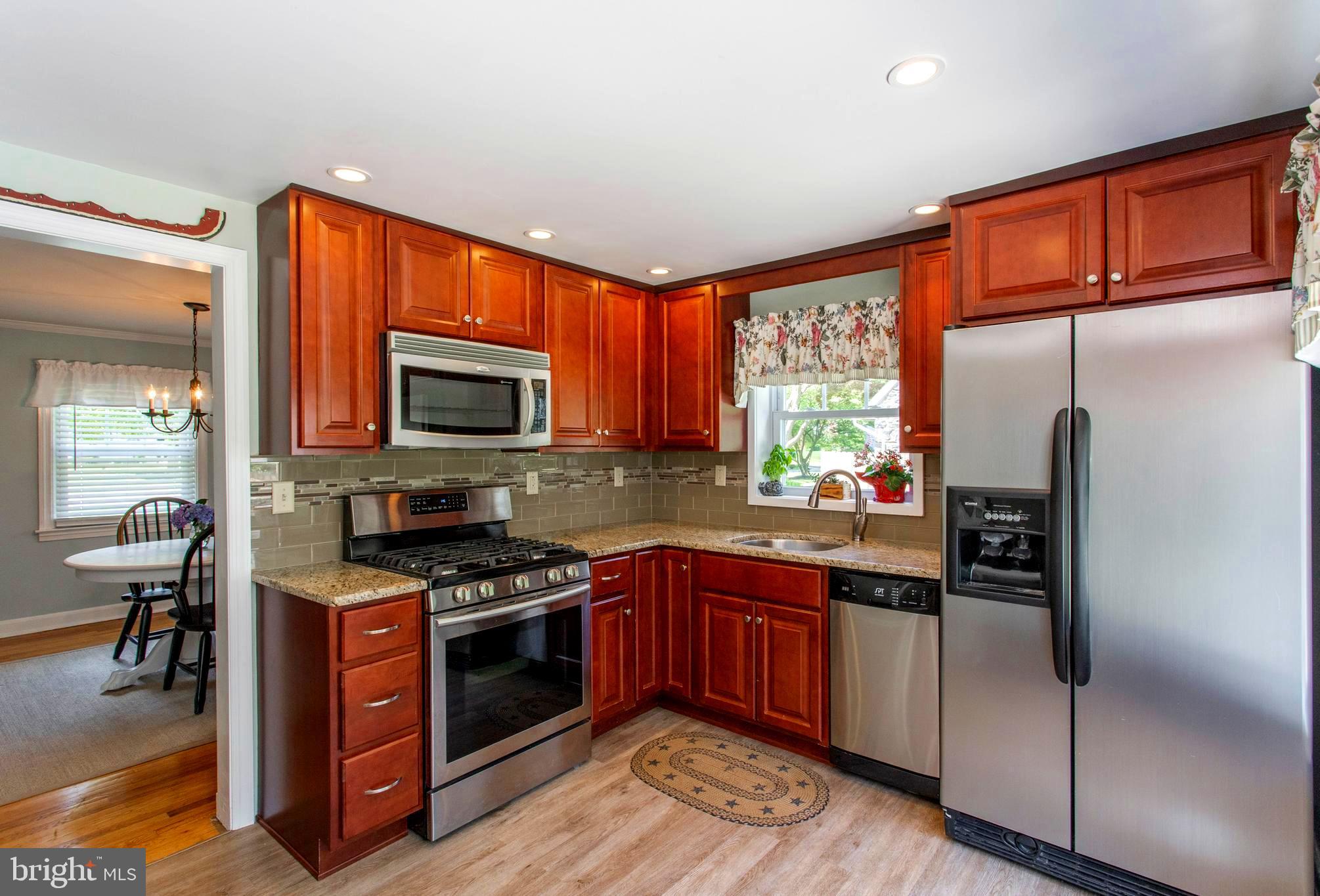 437 Garden Road Springfield, PA 19064 - Photo 8 of 41 Kitchen With Stainless Appliances