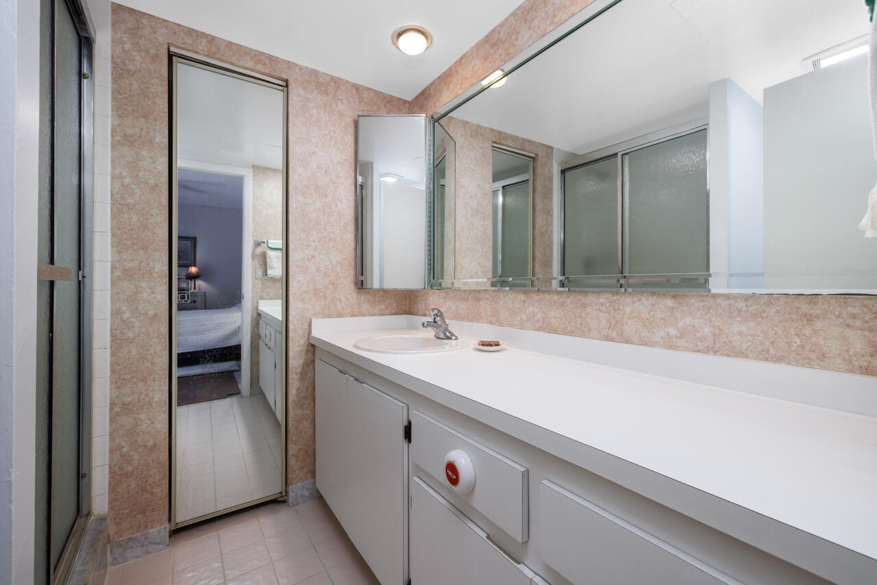 5996 Southeast Riverboat Drive, Unit 539 Stuart, FL 34997 - Photo 16 of 29 a bathroom with a sink and a mirror