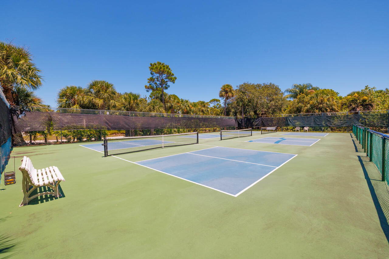 5996 Southeast Riverboat Drive, Unit 539 Stuart, FL 34997 - Photo 26 of 29 a view of swimming pool with outdoor seating and lake view