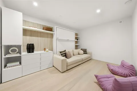 a view of a balcony with dining area