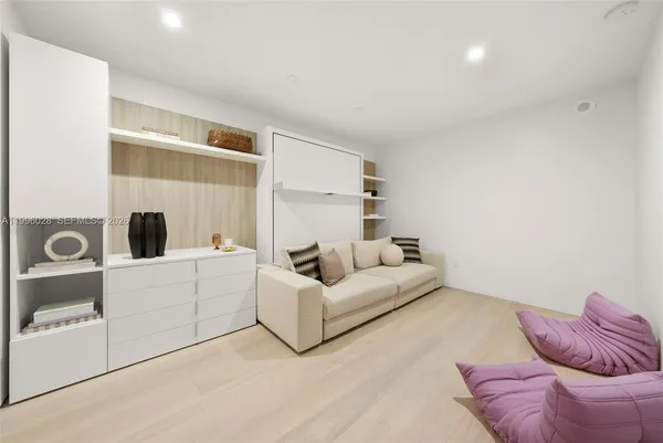 a view of a balcony with dining area