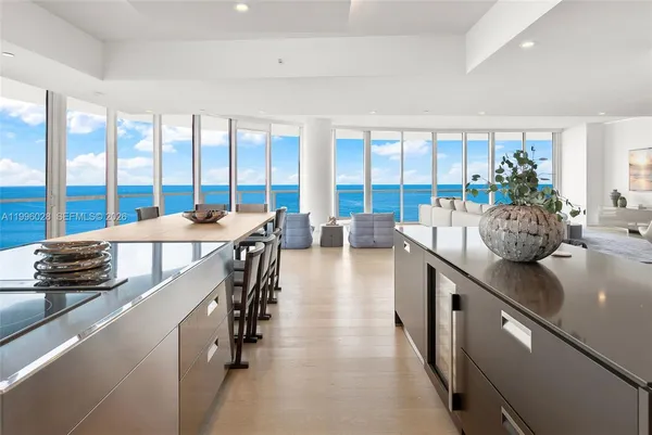 a view of a dining room with furniture window and outside view