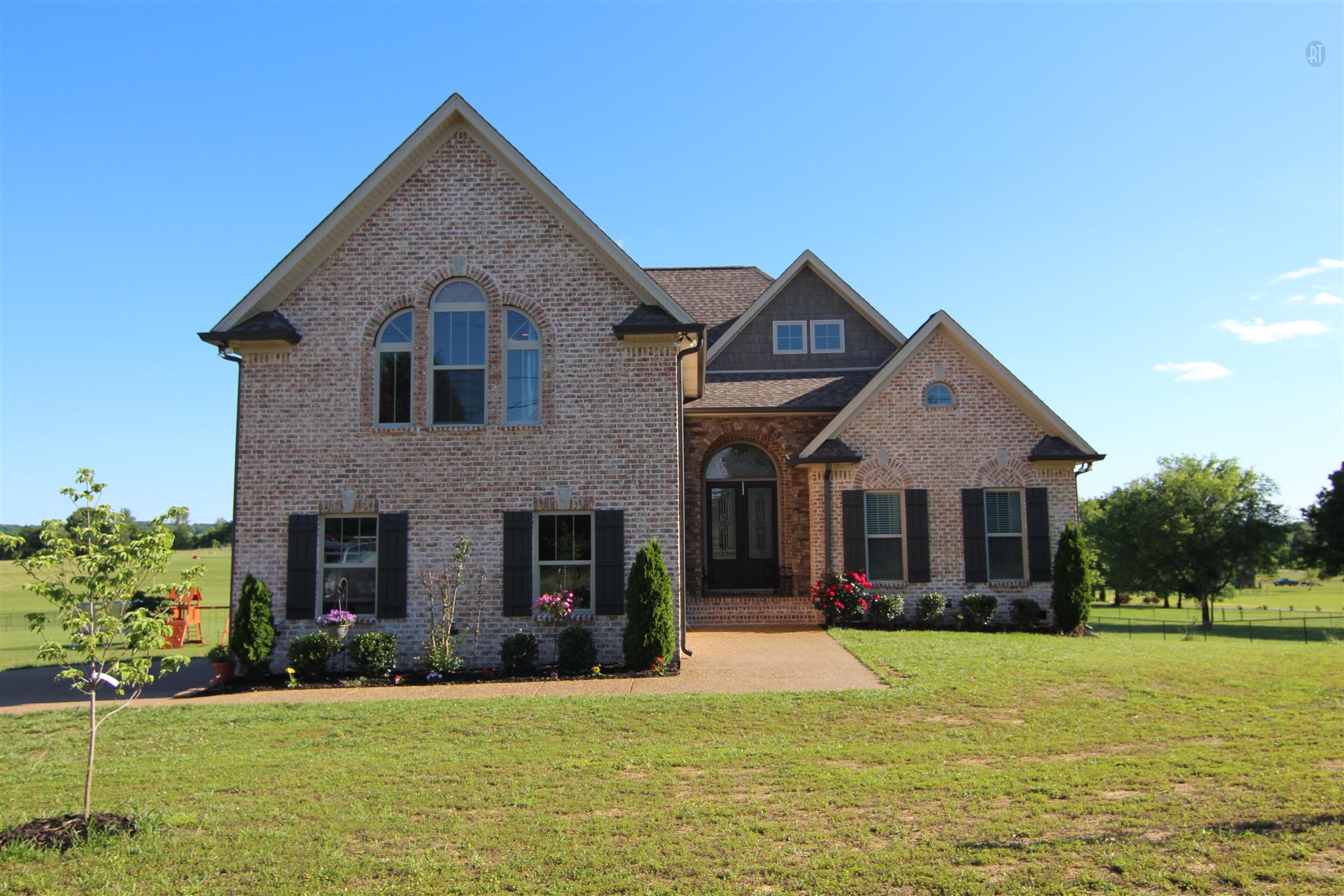 704 Academy Road Lebanon, TN 37087 - Photo 1 of 16 a front view of a house with a yard