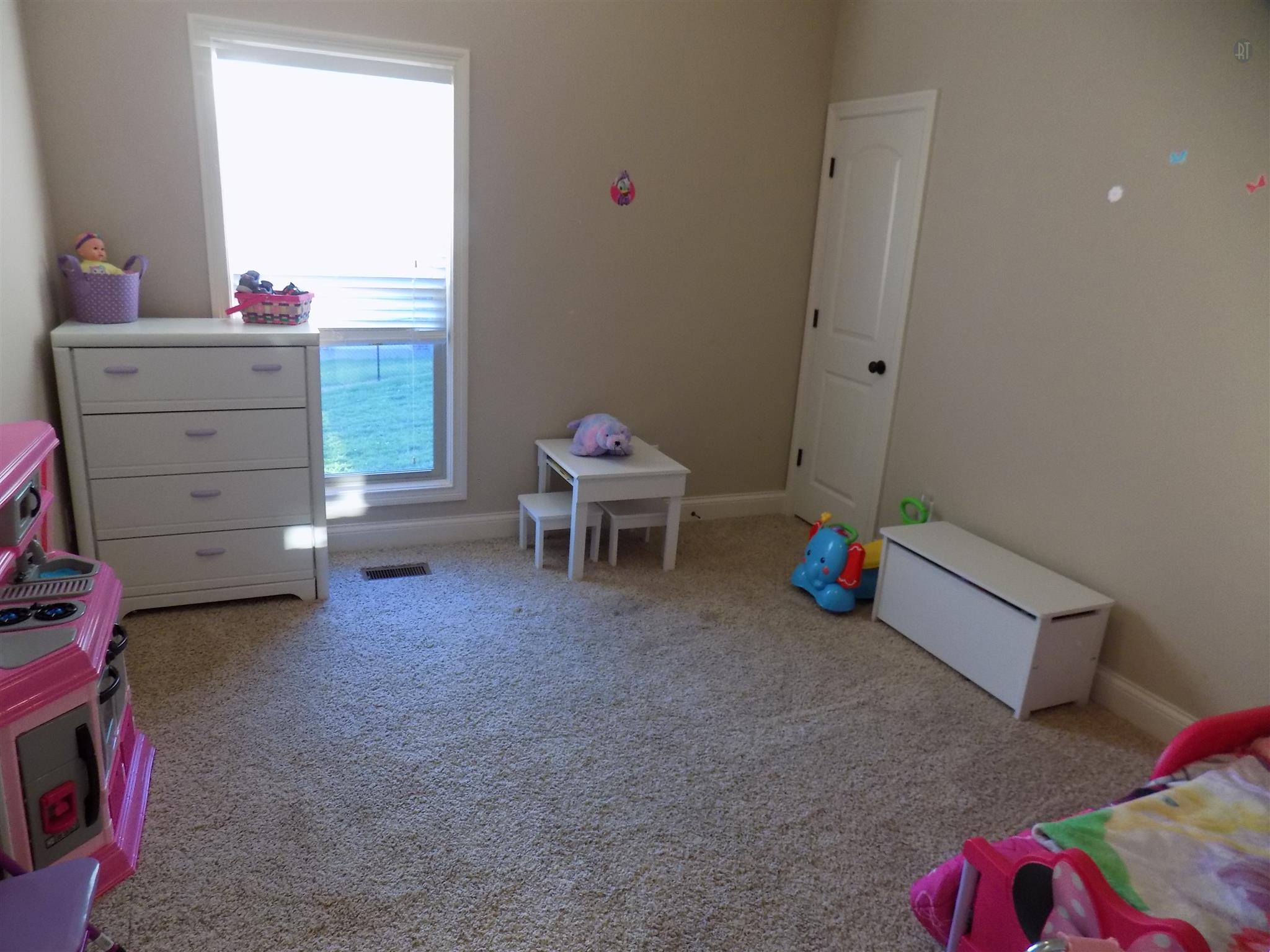 704 Academy Road Lebanon, TN 37087 - Photo 11 of 16 a living room with furniture and a window