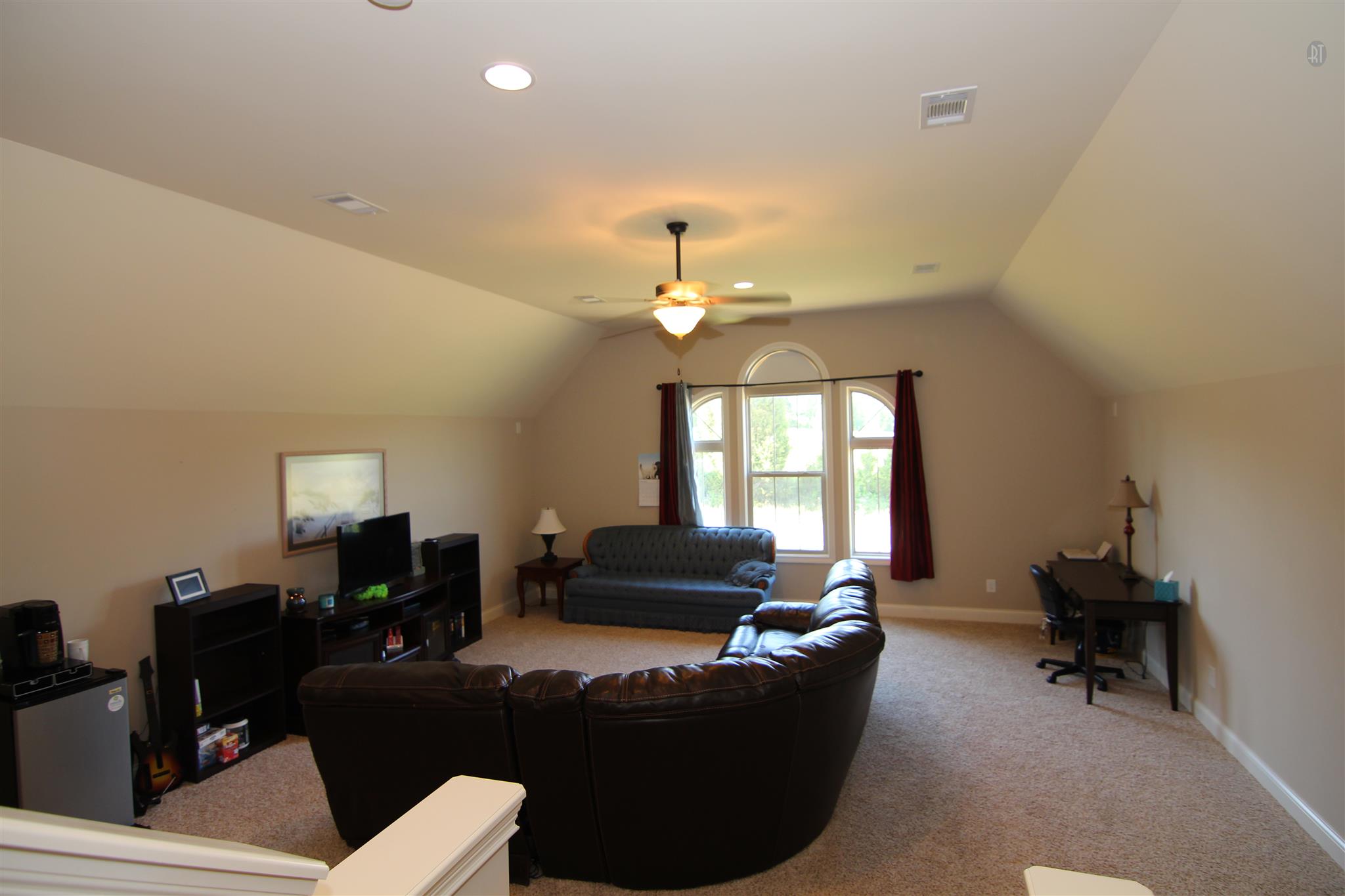 704 Academy Road Lebanon, TN 37087 - Photo 14 of 16 a living room with furniture and a chandelier
