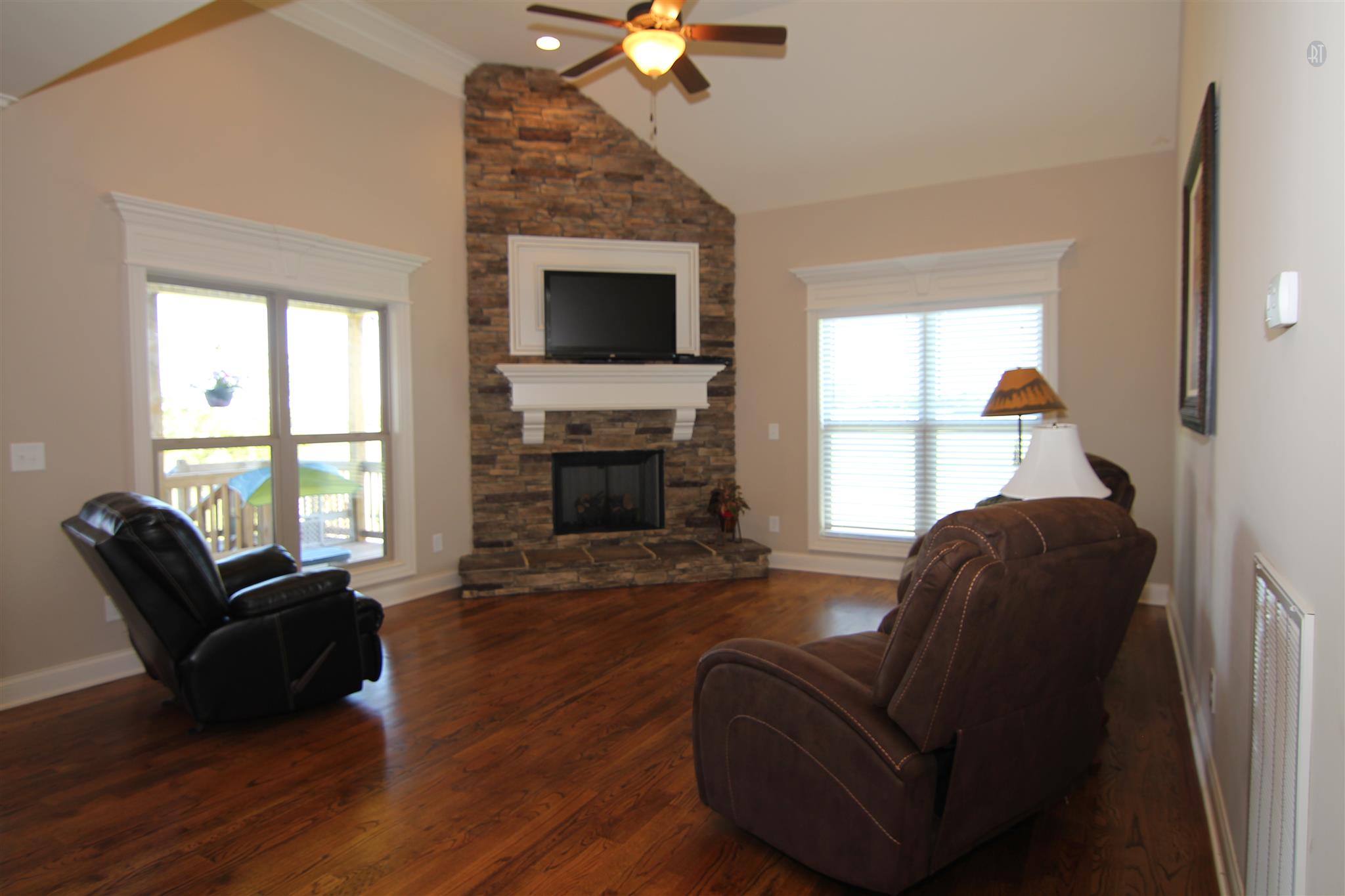 704 Academy Road Lebanon, TN 37087 - Photo 3 of 16 a living room with furniture windows and a fireplace