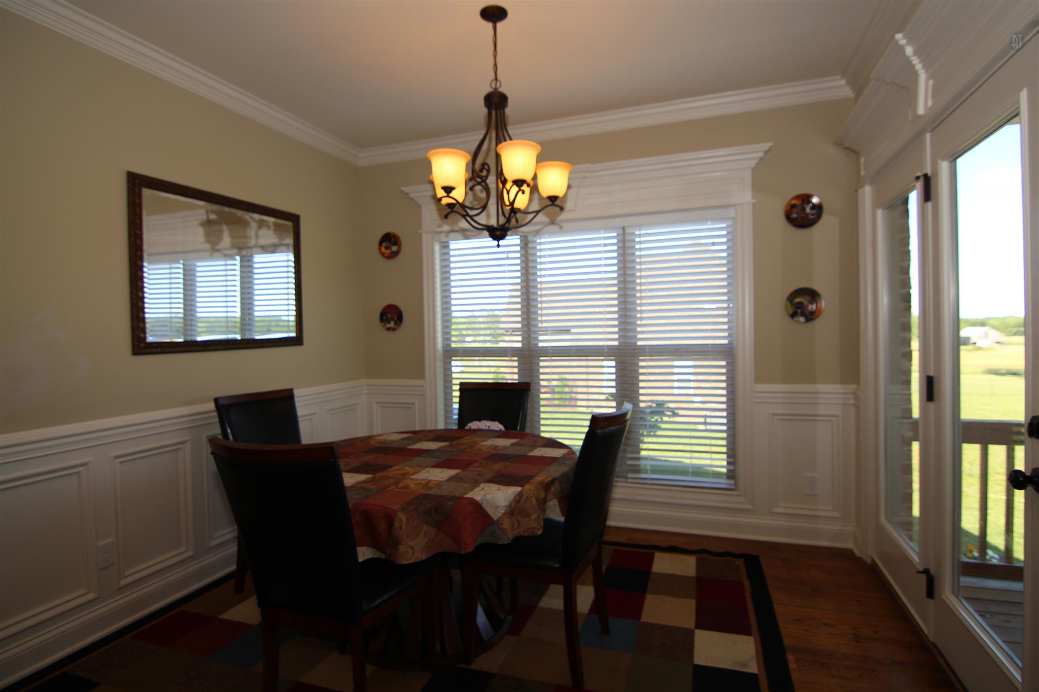 704 Academy Road Lebanon, TN 37087 - Photo 6 of 16 a view of a dining room with furniture window and wooden floor