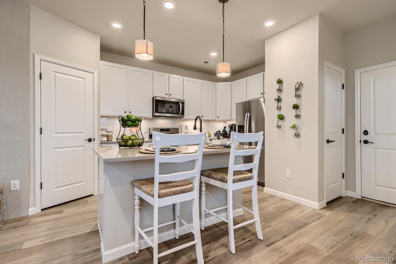 8450 Rizza Street, Unit E Highlands Ranch, CO 80129 - Photo 9 of 29 Gallery Image 9