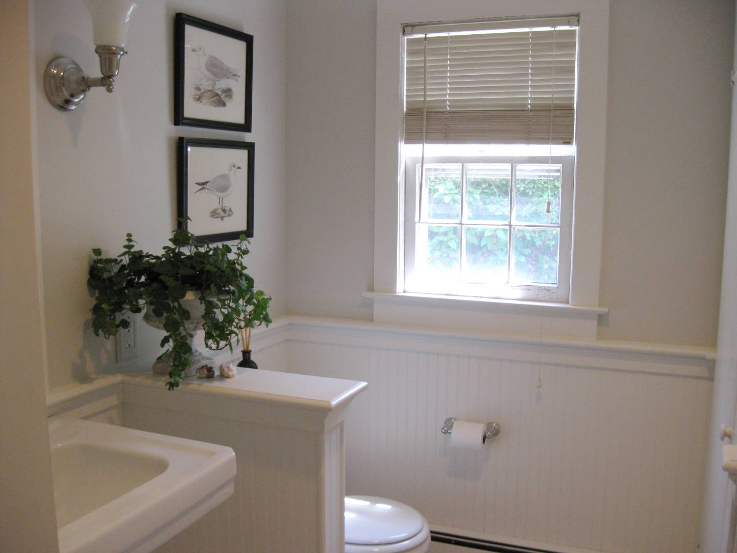 35 Harris Lane Southampton, NY 11968 - Photo 16 of 17 a bath room with a toilet and a sink
