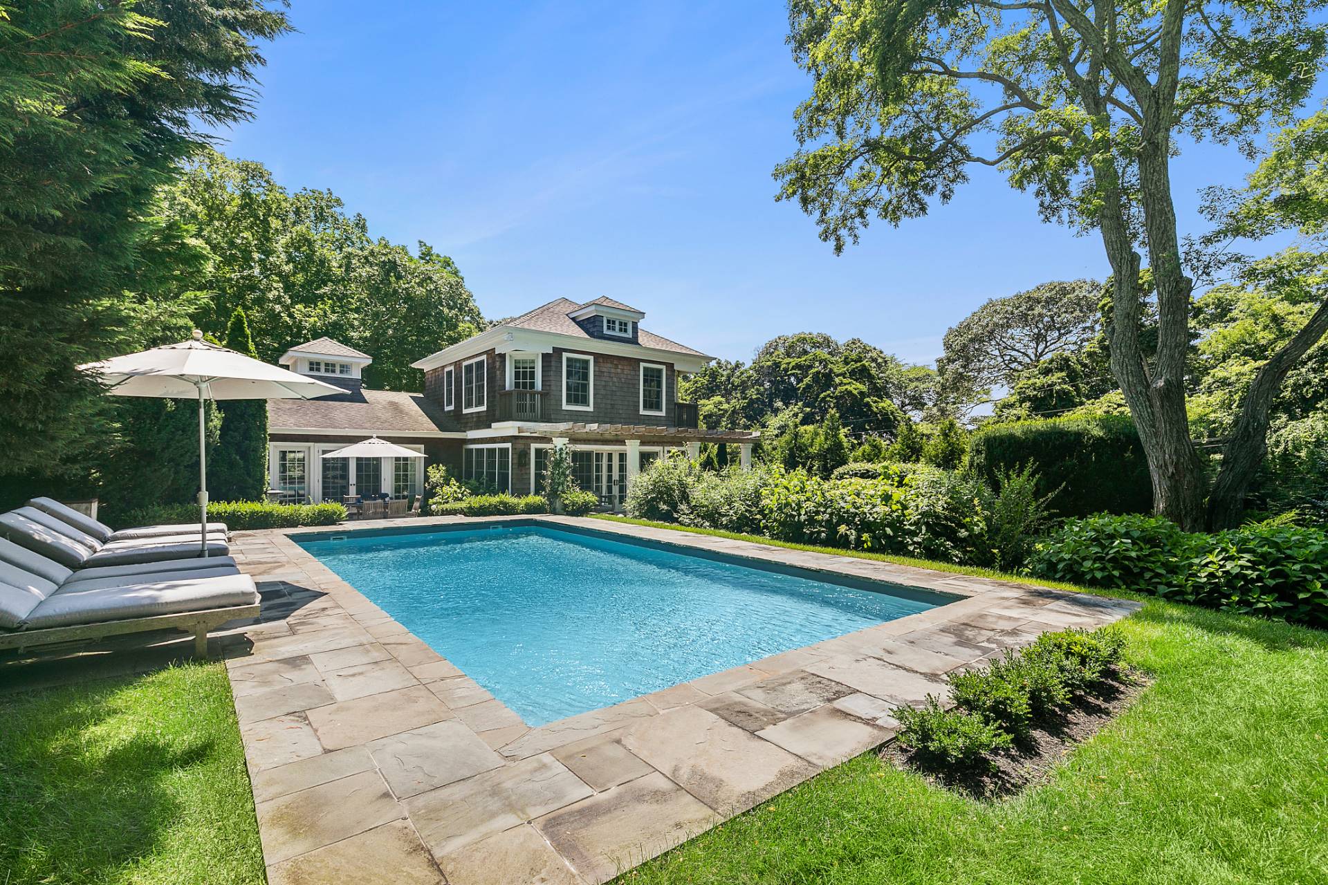 35 Harris Lane Southampton, NY 11968 - Photo 6 of 17 a view of a house with a yard