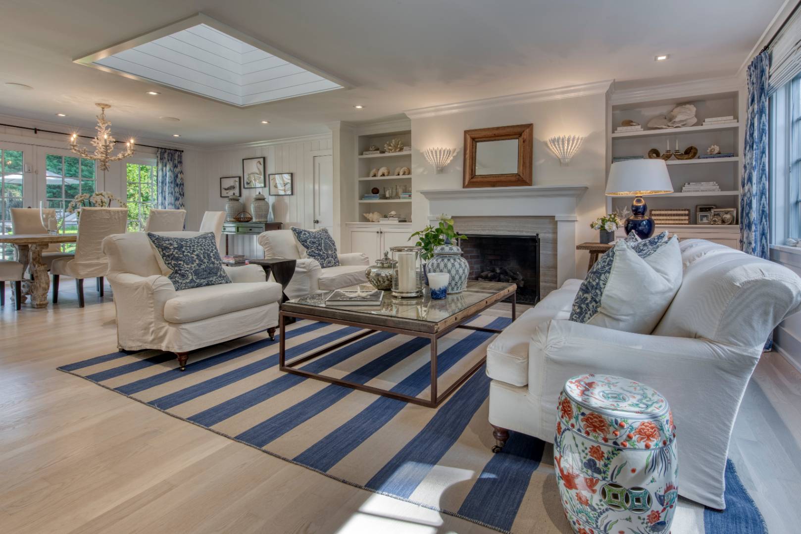 35 Harris Lane Southampton, NY 11968 - Photo 9 of 17 a living room with furniture and a fireplace