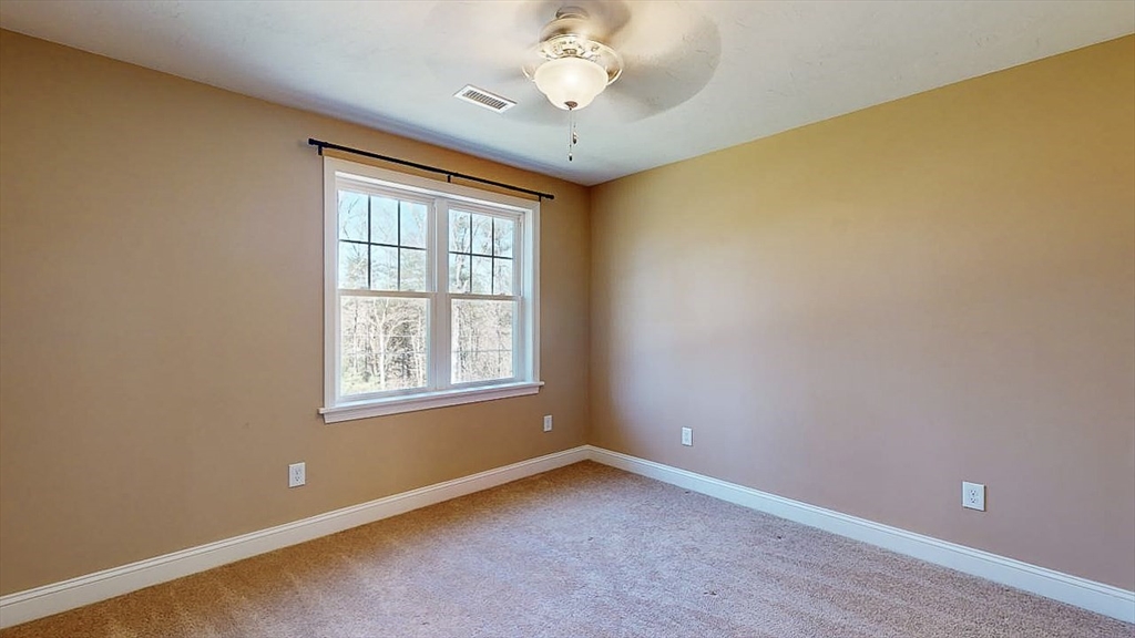 577 Podunk Road East Brookfield, MA 01515 - Photo 24 of 42 a view of an empty room with a window