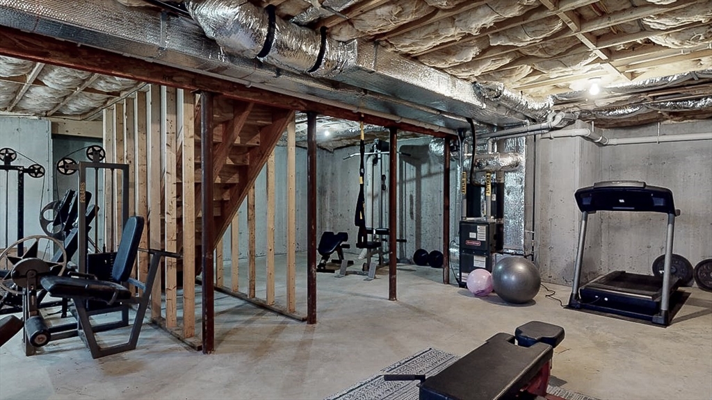 577 Podunk Road East Brookfield, MA 01515 - Photo 34 of 42 a view of a room with gym equipment