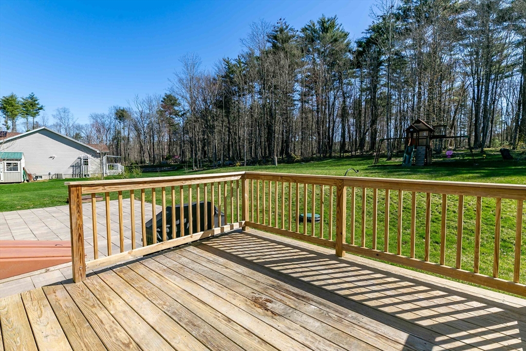 577 Podunk Road East Brookfield, MA 01515 - Photo 35 of 42 a view of a wooden roof deck