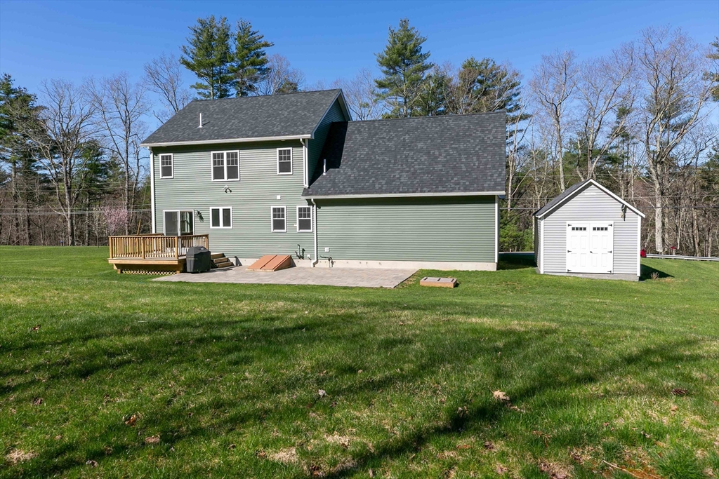 577 Podunk Road East Brookfield, MA 01515 - Photo 38 of 42 a front view of house with garden