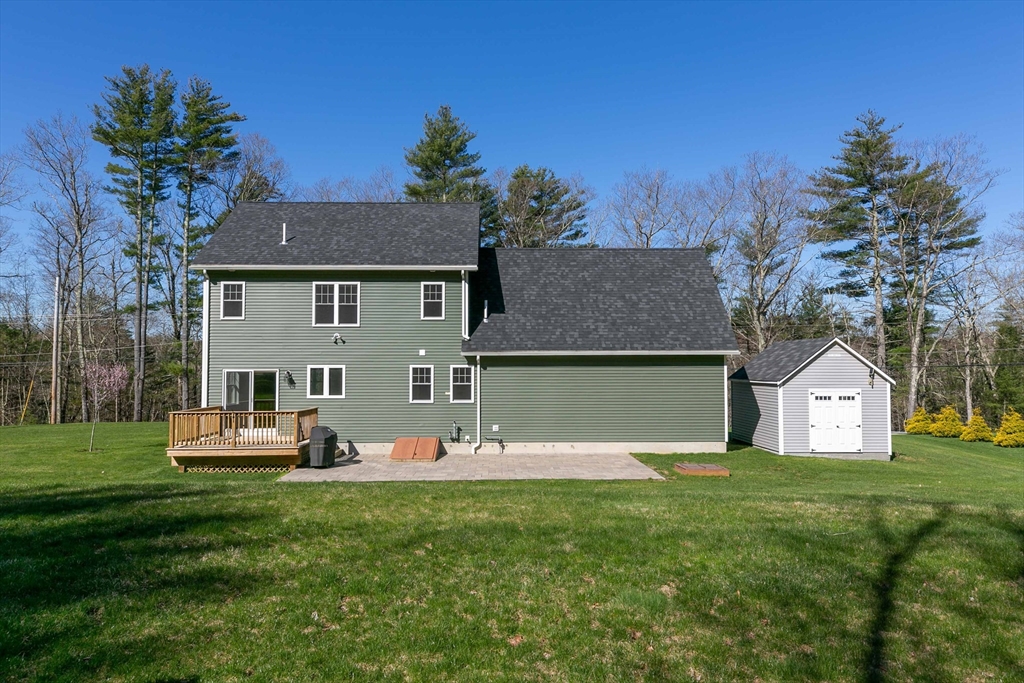 577 Podunk Road East Brookfield, MA 01515 - Photo 39 of 42 a front view of house with garden