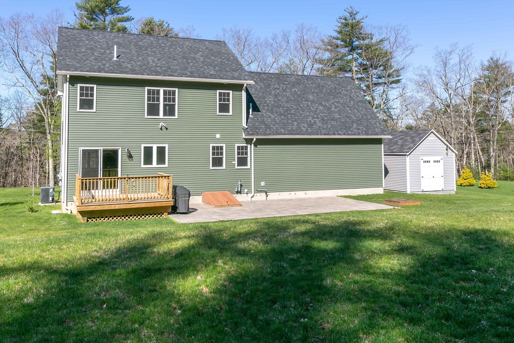 577 Podunk Road East Brookfield, MA 01515 - Photo 40 of 42 a front view of house with yard and green space