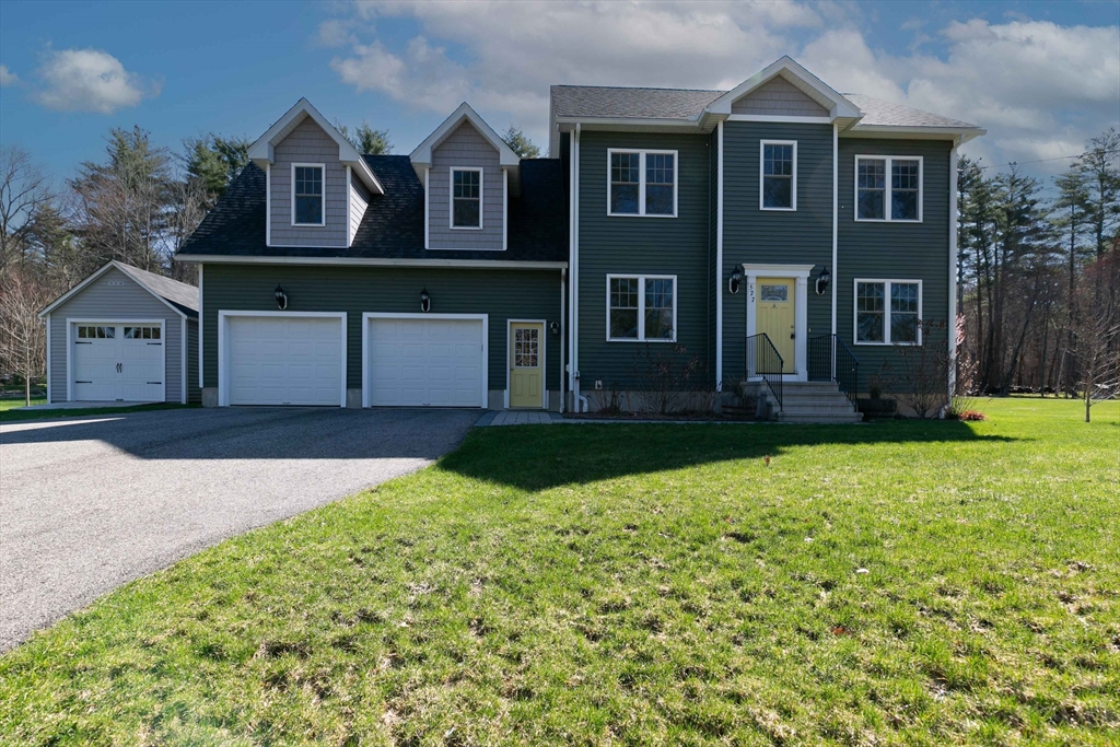 577 Podunk Road East Brookfield, MA 01515 - Photo 42 of 42 a front view of a house with garden
