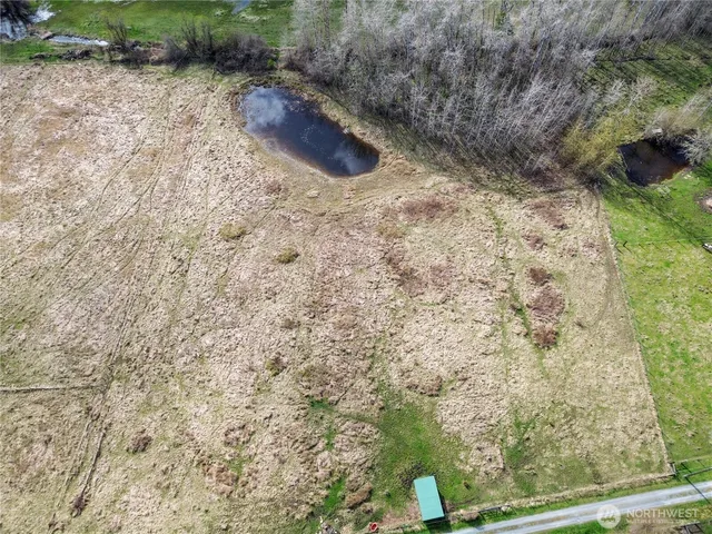 a view of a backyard with water fall and outdoor