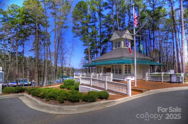 a front view of a building with a garden