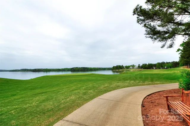 a view of a golf course with outside space