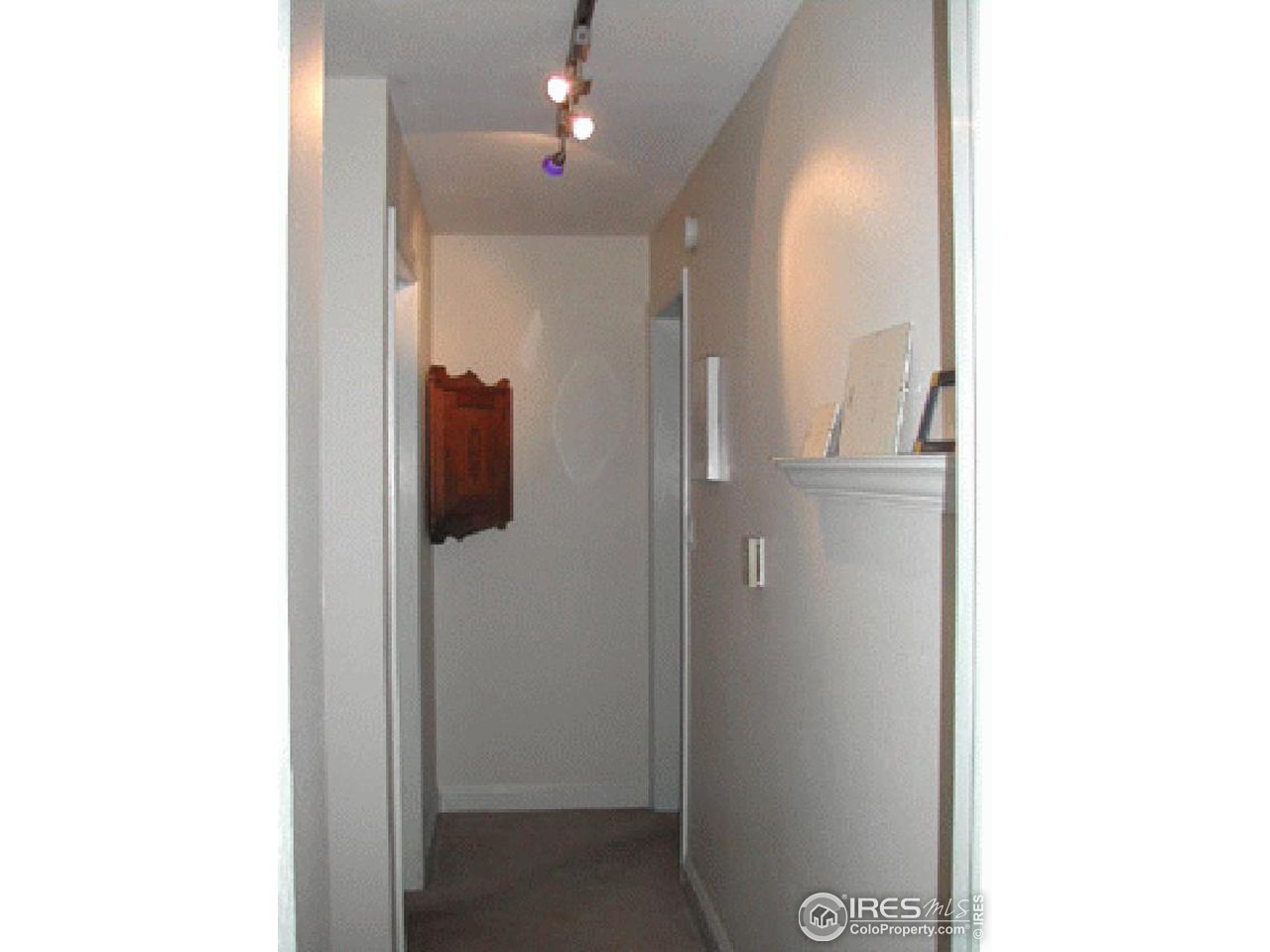 1895 Alpine Avenue, Unit 22 Boulder, CO 80304 - Photo 5 of 11 a view of a hallway with front door