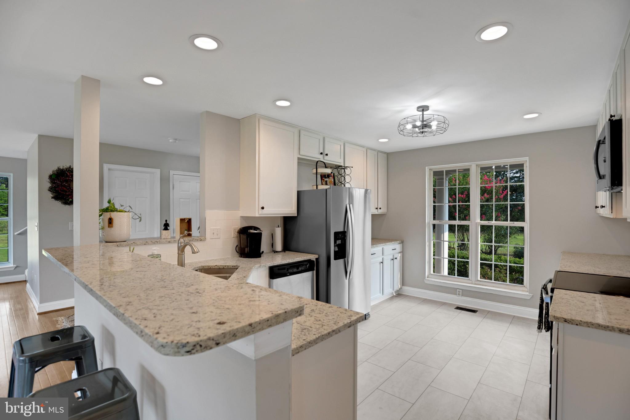 1595 Mallard Point Road Prince Frederick, MD 20678 - Photo 14 of 59 Updated Kitchen with Bar Seating