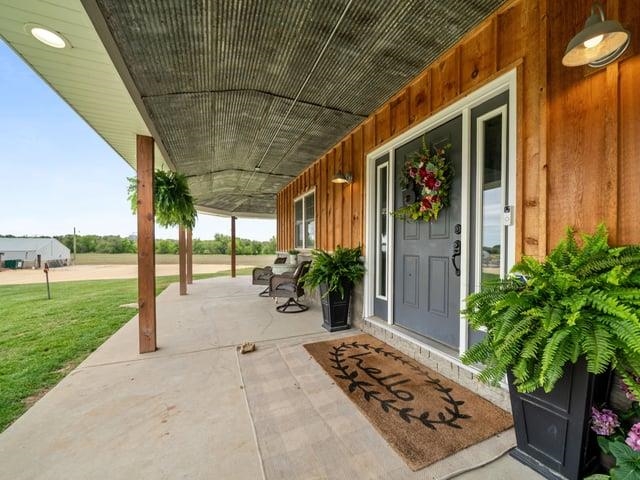 8294 North Leaf River Road Leaf River, IL 61047 - Photo 52 of 56 a view of a porch with garden