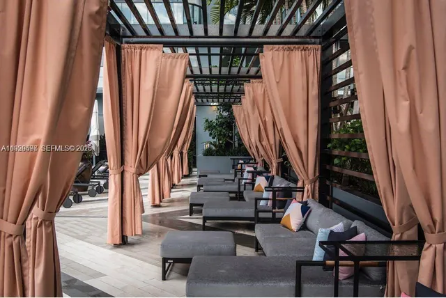 a view of entryway with wooden floor and stairs