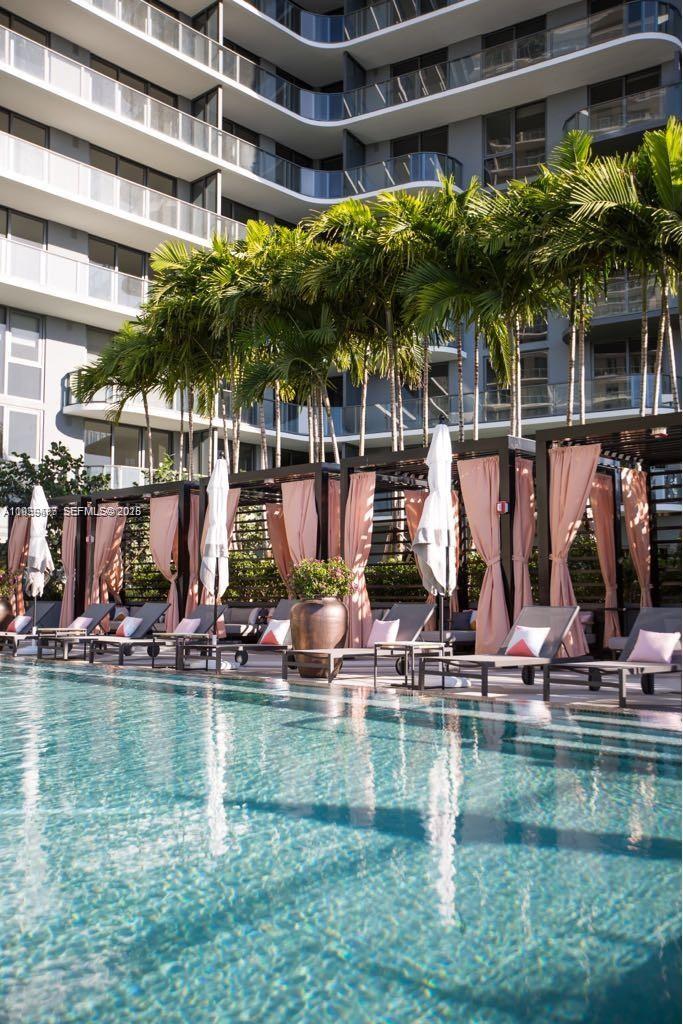 121 Northeast 34th Street, Unit 1203 Miami, FL 33137 - Photo 22 of 26 a view of a water fountain in front of a building