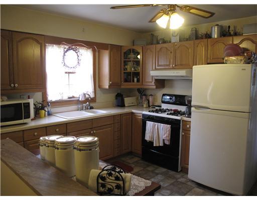 297 Coraopolis Road Coraopolis, PA 15108 - Photo 6 of 18 Kitchen. Remodeled kitchen with wood cabinets and updated appliances.