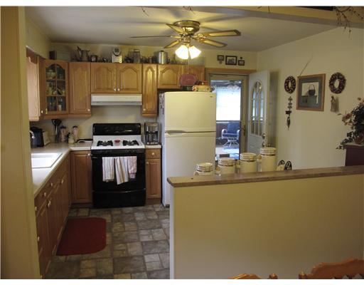 297 Coraopolis Road Coraopolis, PA 15108 - Photo 7 of 18 Kitchen. Kitchen leads to 3 seasons room.