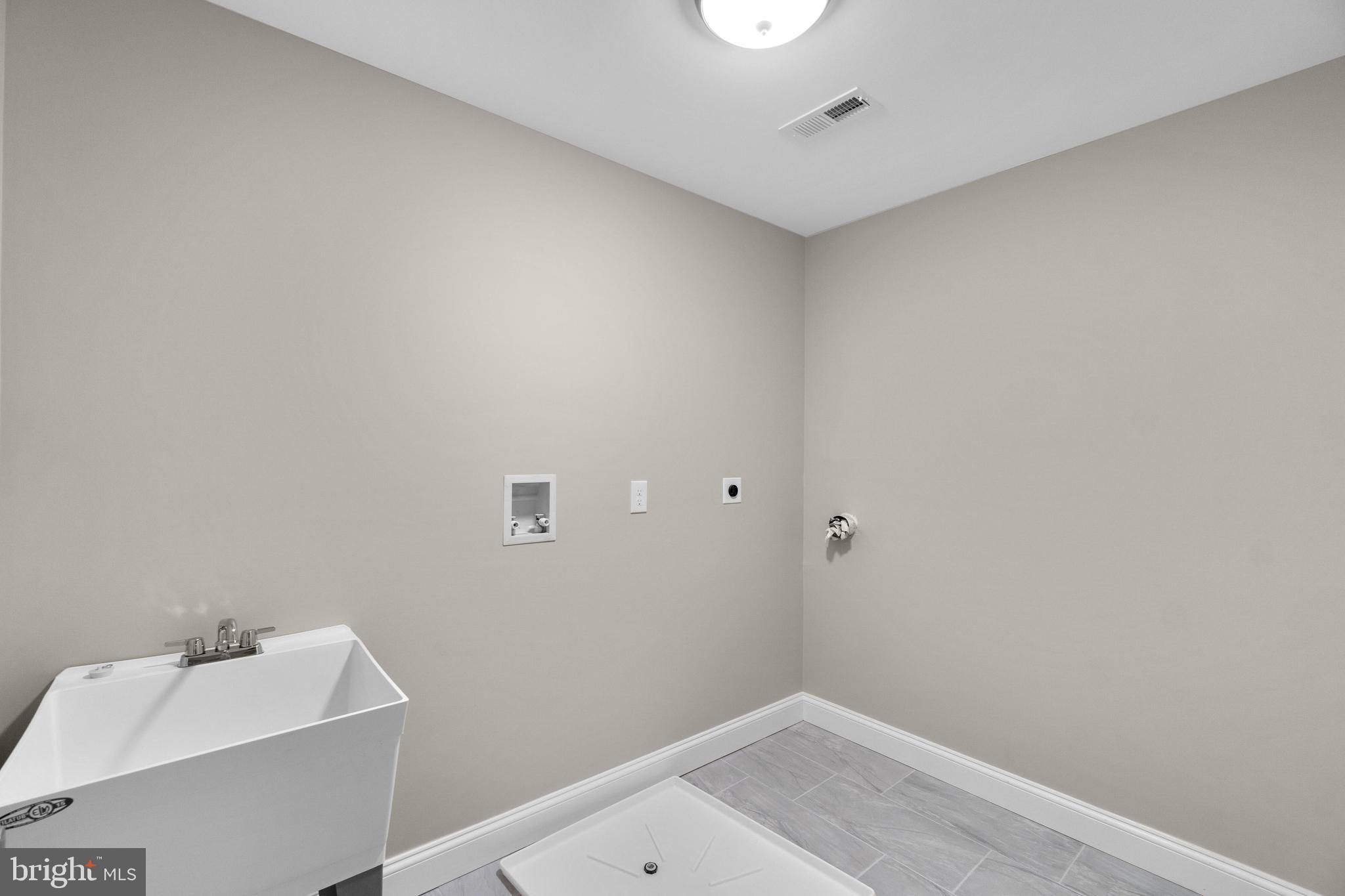 24 Millstone Road Randallstown, MD 21133 - Photo 34 of 50 Upper Level Laundry Area