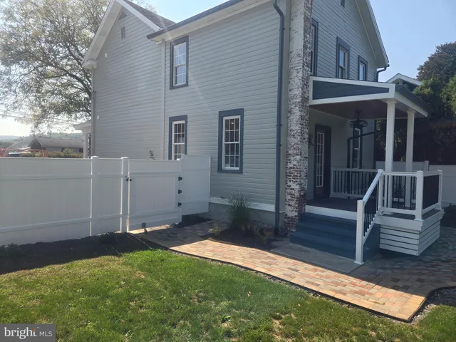a house view with a garden space