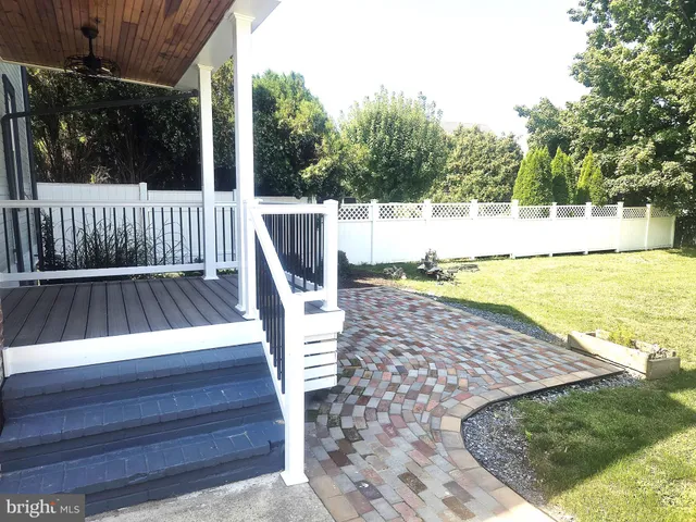 a view of a golf course with a big yard