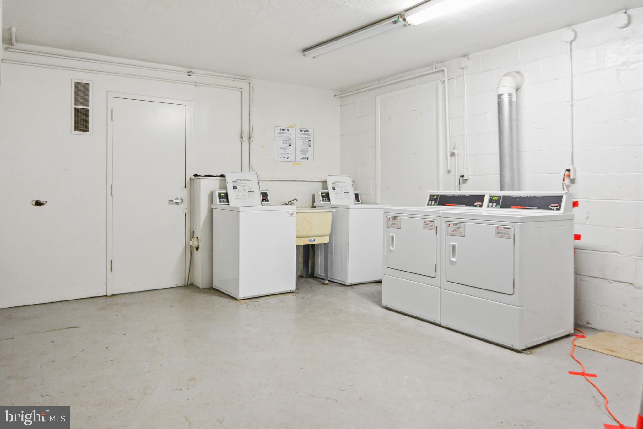 4415 Falls Bridge Drive, Unit K Baltimore, MD 21211 - Photo 18 of 18 a utility room with cabinets