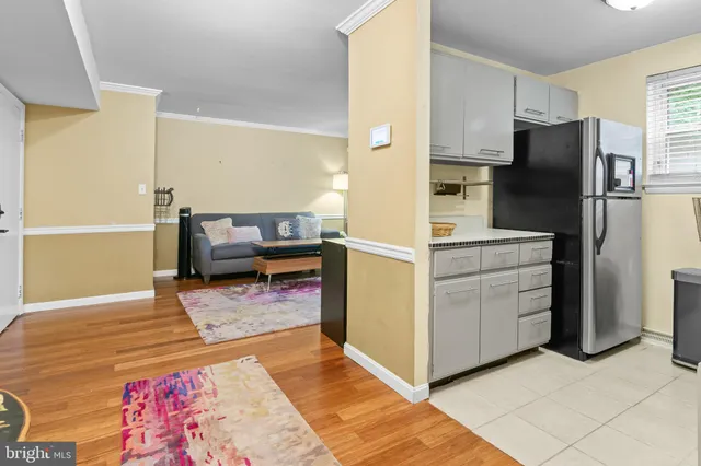a kitchen with a stove microwave and refrigerator