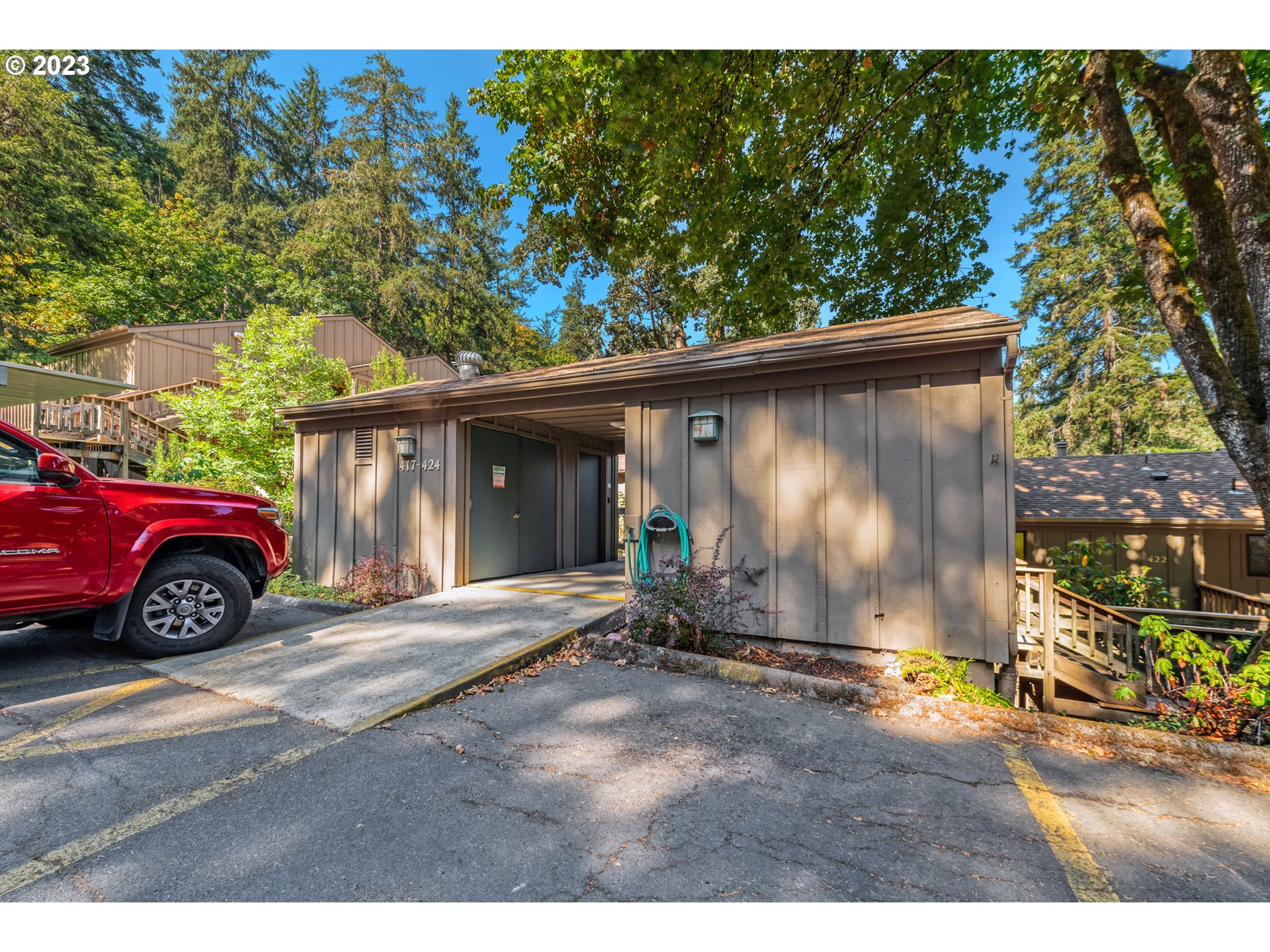 422 Stonewood Drive Eugene, OR 97405 - Photo 26 of 32 a view of a car park in front of a house