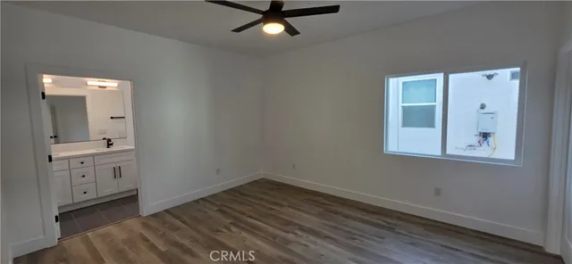a view of a bathroom with sink and mirror