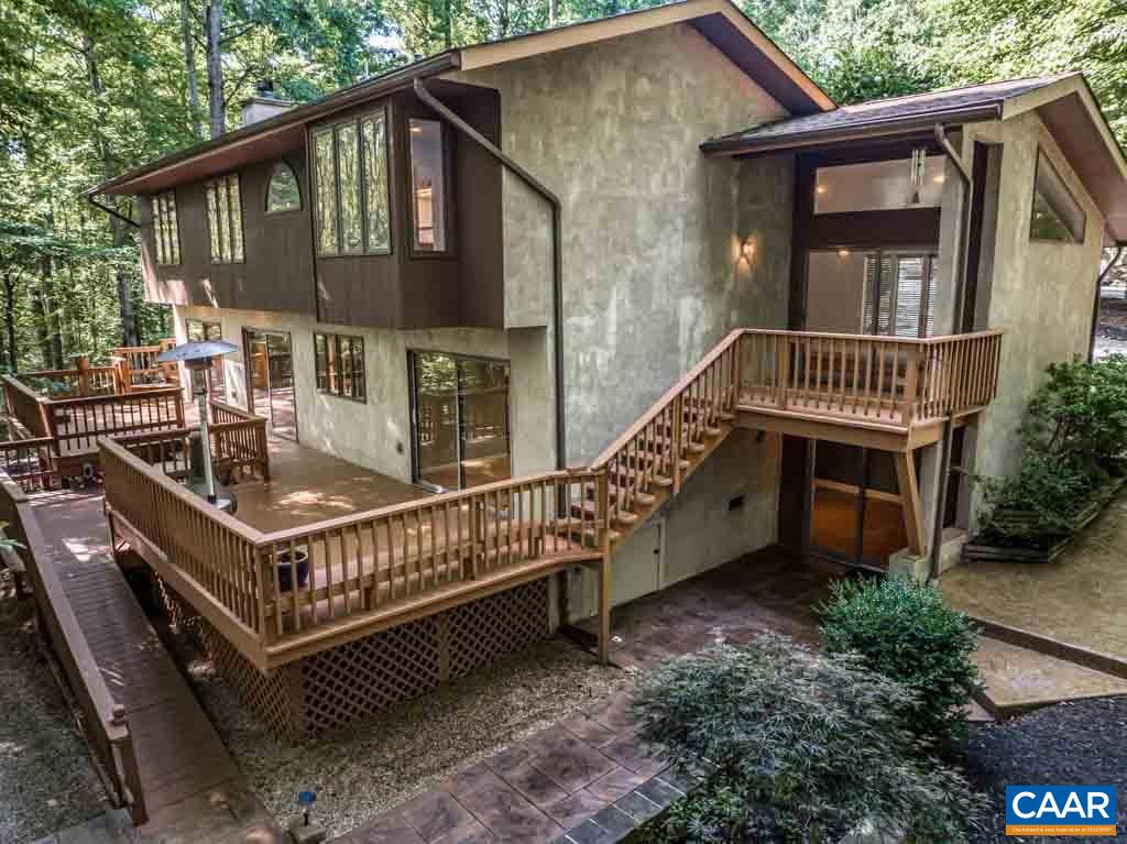 12 Rowell Road Palmyra, VA 22963 - Photo 51 of 75 a view of a house with a deck and furniture